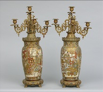 Appraisal: Pair of Satsuma-style Nagasaki Ware Candelabras The pair presents vases