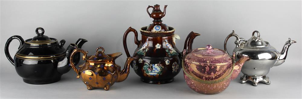 Appraisal: FIVE ENGLISH POTTERY TEAPOTS AND COVERS mid to late th