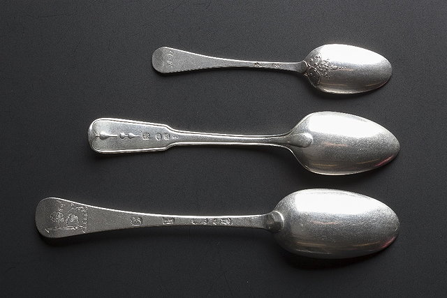 Appraisal: A SILVER HANOVARIAN STYLE SMALL DESSERT SPOON with frontal rat