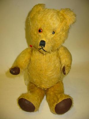 Appraisal: A Ting-a-Ling teddy bear kapok filled covered in gold plush