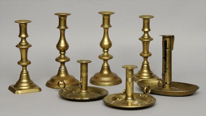 Appraisal: TWO PAIRS OF BRASS CANDLESTICKS AND THREE BRASS CHAMBERSTICKS Each