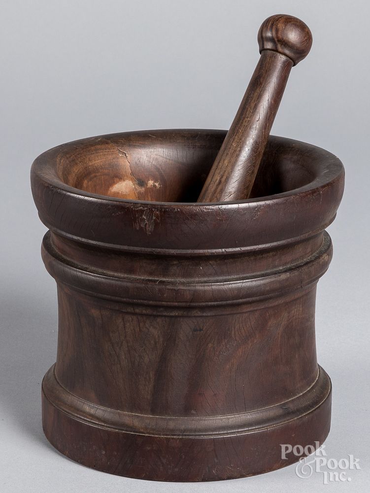 Appraisal: Lignum vitae mortar and pestle th c Lignum vitae mortar