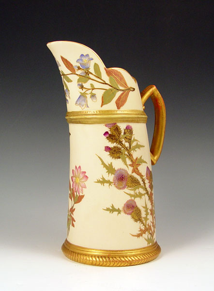 Appraisal: ROYAL WORCESTER PITCHER Thistle floral and gold gilt decoration Measures