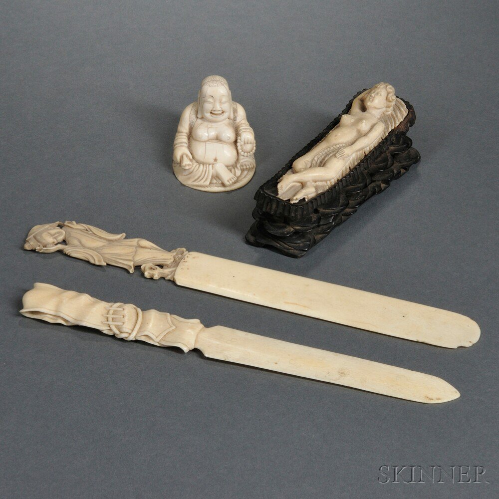 Appraisal: Four Ivory Items Asian two page turners with figural and