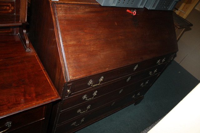 Appraisal: A GEORGE III MAHOGANY LARGE BUREAU the interior fitted with