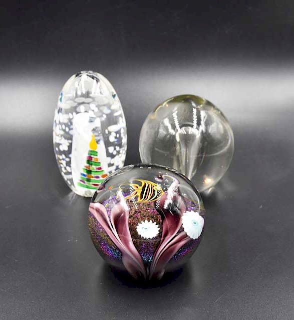 Appraisal: Paperweights Paperweights clear is signed Erickson fish is signed Lundberg