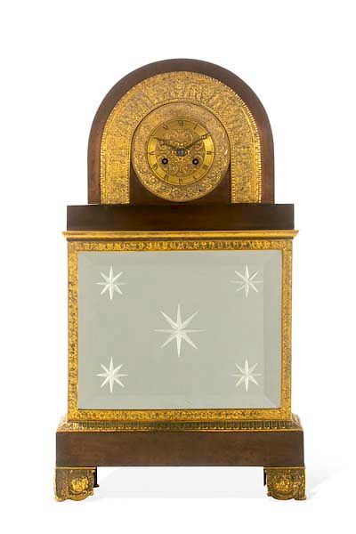 Appraisal: A Charles X bronze and glass mantel clock A Charles