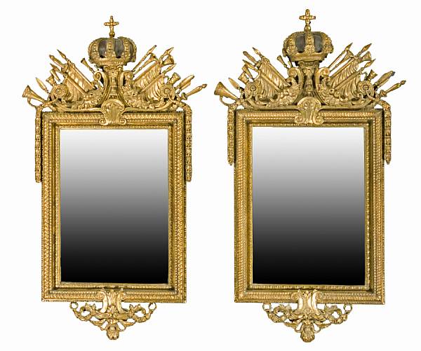 Appraisal: A pair of Continental Neoclassical style giltwood mirrors Each with