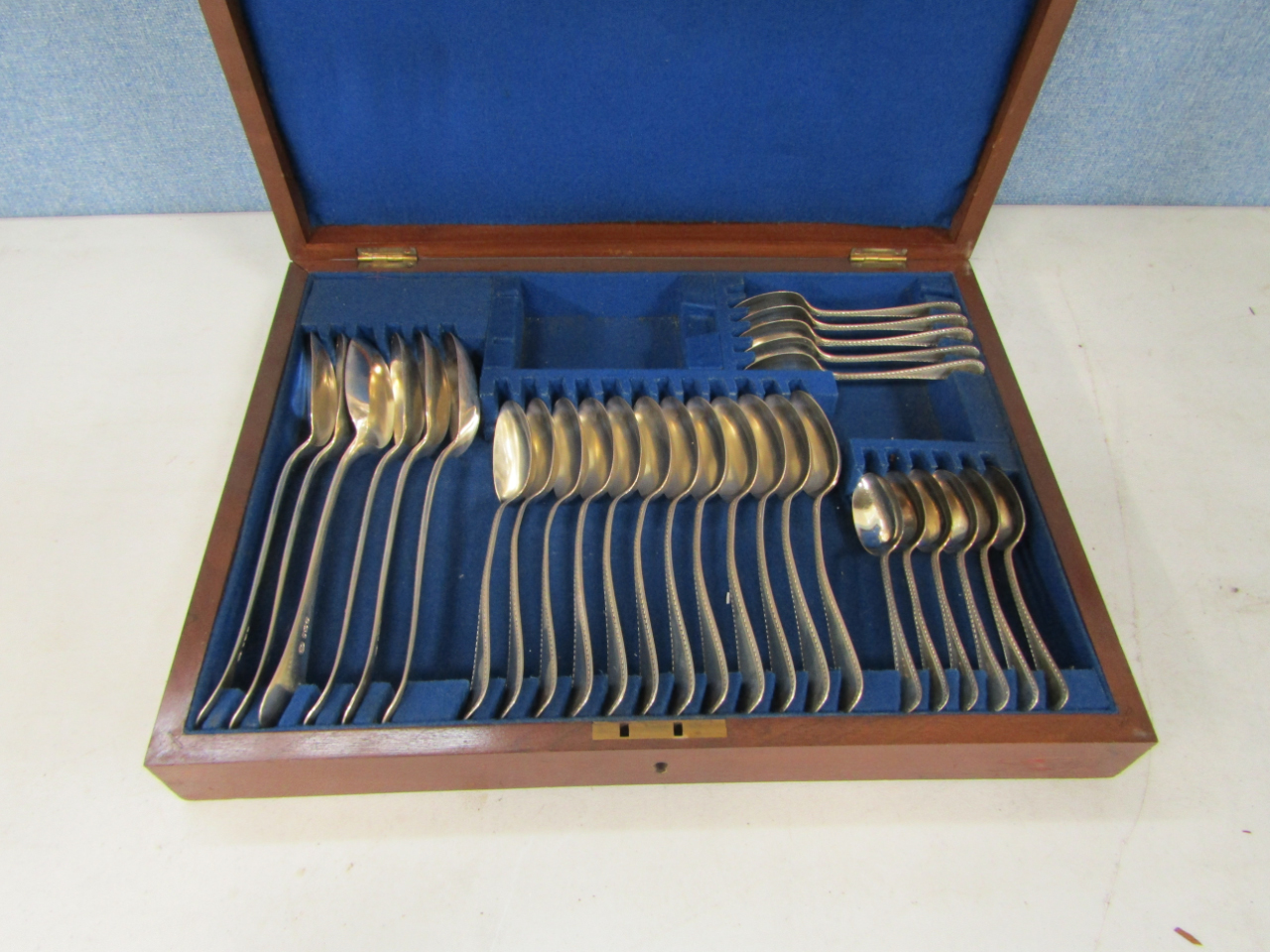 Appraisal: A Victorian cased set of silver spoons including serving spoons