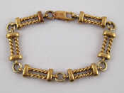 Appraisal: A yellow metal tests carat gold bracelet approx cm long