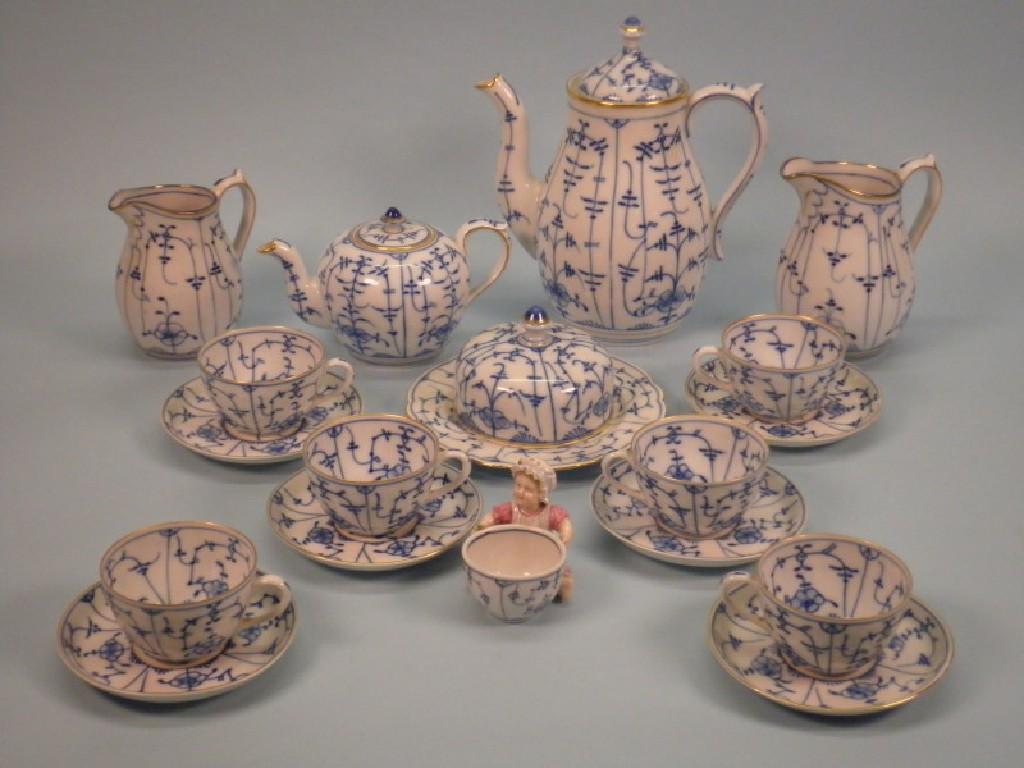 Appraisal: A German porcelain part tea service decorated in underglaze blue