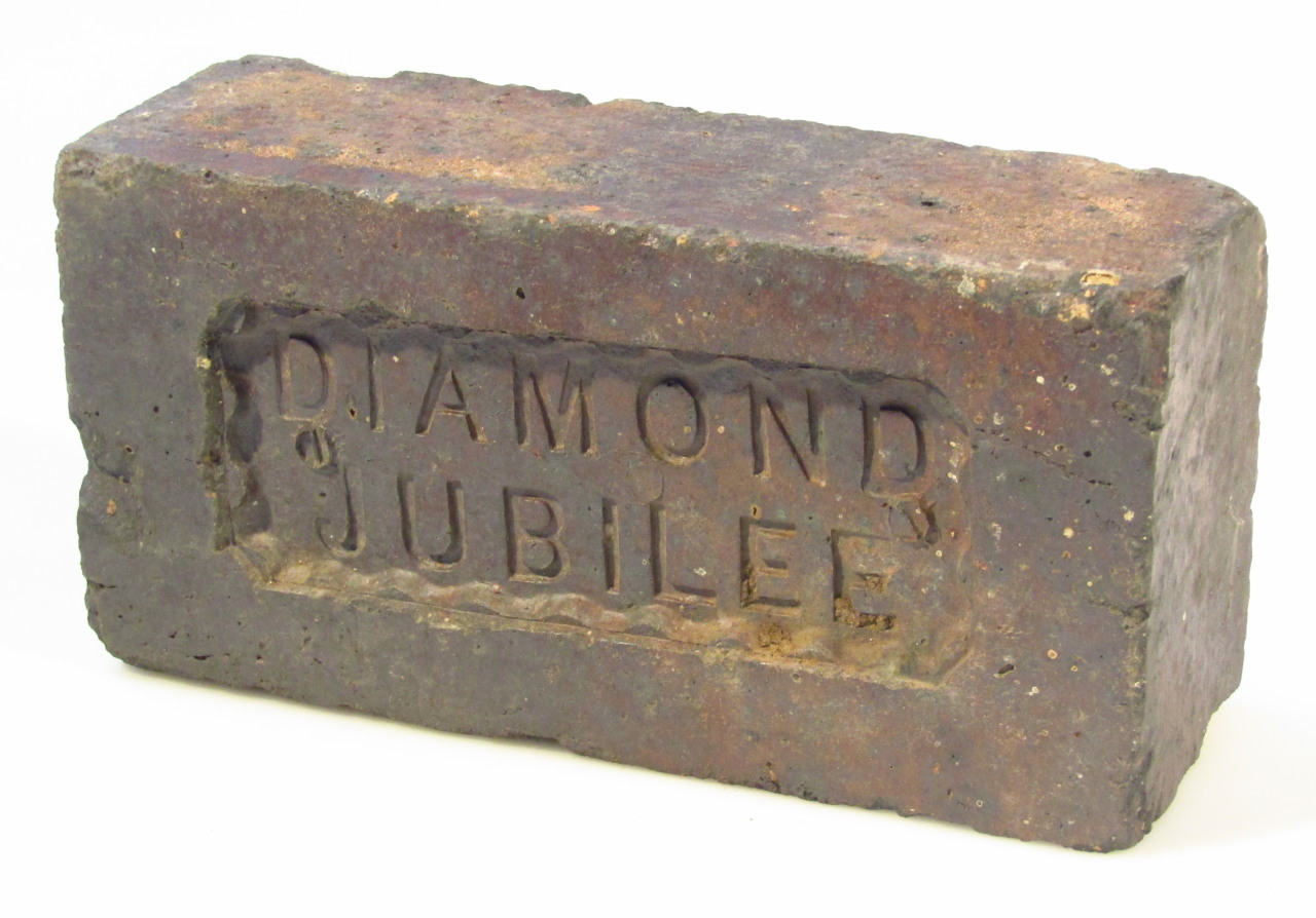 Appraisal: A Queen Victoria Diamond Jubilee brick cm high