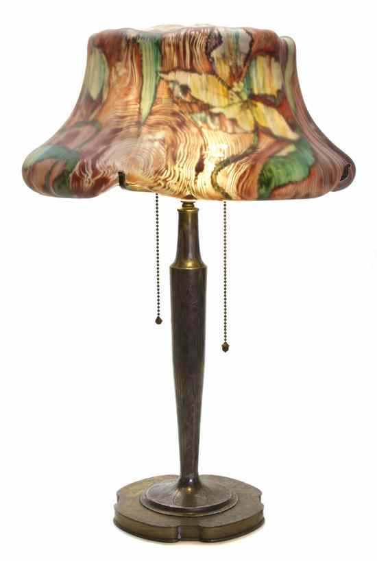 Appraisal: A Pairpoint Puffy Reverse Painted Lamp with floral decoration raised