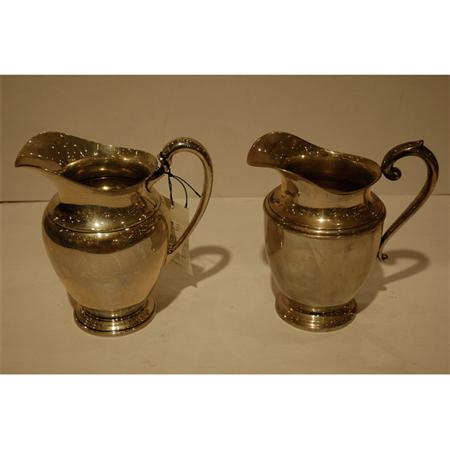 Appraisal: Two Sterling Silver Water Pitchers Estimate -