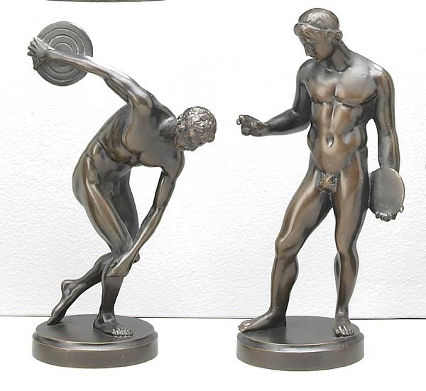 Appraisal: A pair of Austrian patinated bronze figures of discus throwers