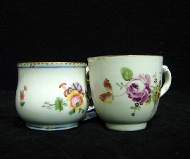 Appraisal: Two hand painted demitasse cups French and English with a