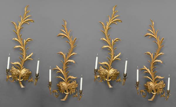 Appraisal: A set of four Rococo style giltwood and gesso two