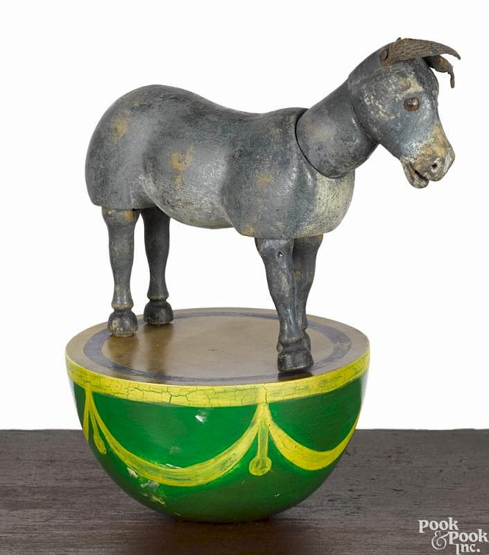 Appraisal: Schoenhut half rolly dolly burro painted wood toy with glass