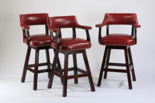 Appraisal: Bar stools upholstered in faux alligator leather Set of three