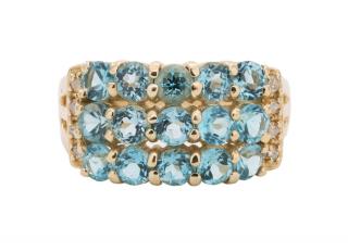 Appraisal: A THREE-ROW BLUE TOPAZ RING WITH DIAMONDS Three rows of