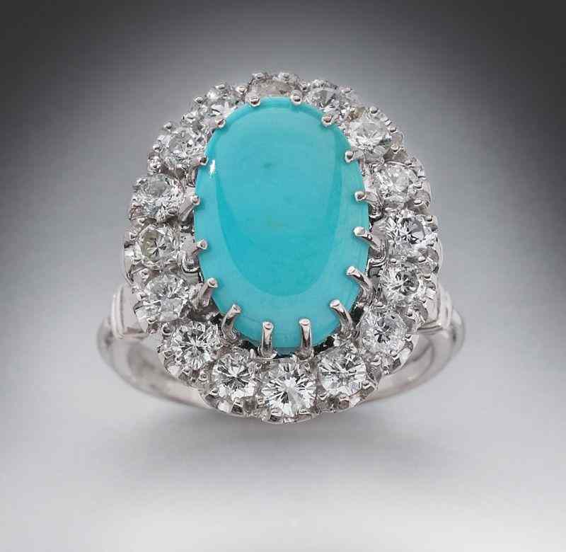 Appraisal: Persian turquoise and diamond ringfeaturing a cabochon cut turquoise cts