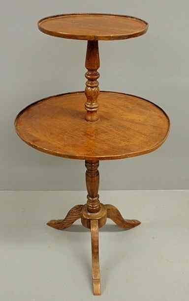 Appraisal: French fruitwood two-tiered dumbwaiter h x dia