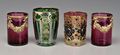 Appraisal: Four ornate glass tumblers pair cranberry with applied brass swags