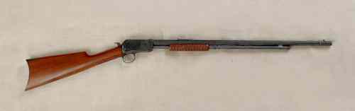 Appraisal: Winchester Model slide action rifle rimfire cal serial octagonal barrel