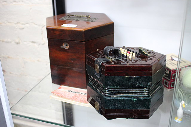 Appraisal: AN ANTIQUE POSSIBLY TH CENTURY ROSEWOOD BUTTON CONCERTINA with decoratively