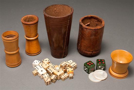 Appraisal: Five assorted carved wood and leather dice tumblers and assorted