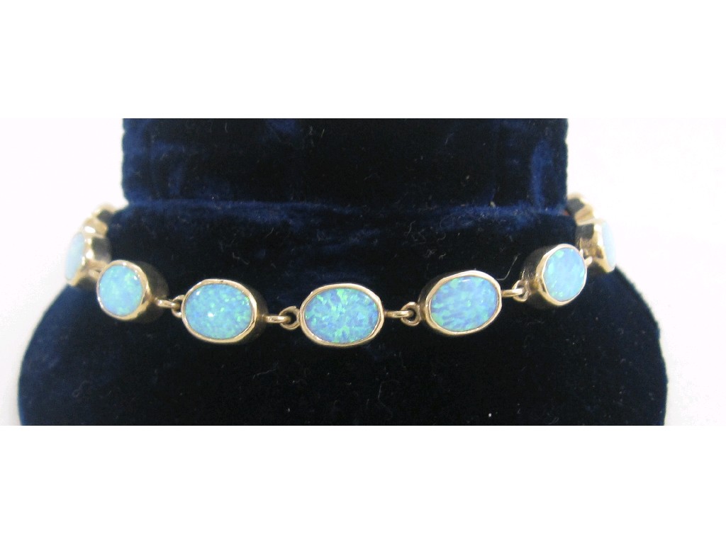 Appraisal: Nine carat gold mounted opal bracelet