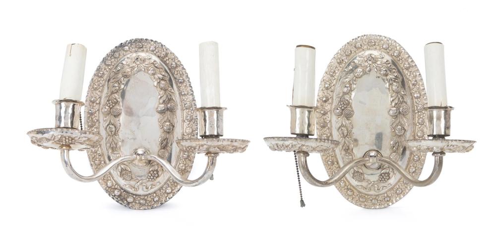 Appraisal: A pair of Caldwell silver plated sconces First-half th Century