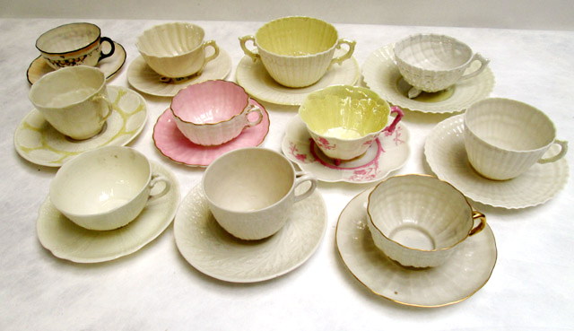 Appraisal: ELEVEN BELLEEK CUP AND SAUCERS in various patterns and having