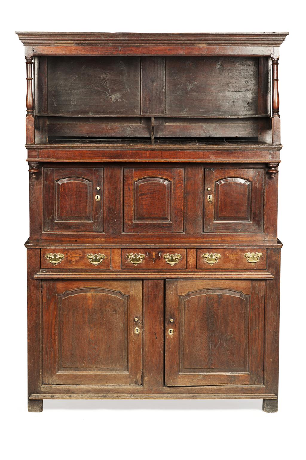 Appraisal: WELSH OAK TRIDARN CUPBOARD EARLY TH CENTURY the moulded cornice