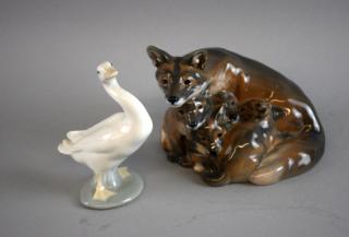 Appraisal: Royal Copenhagen group of foxes cm and Lladro figure of