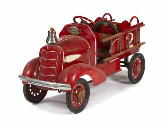 Appraisal: An American Pressed Metal Pedal Car having red paint throughout