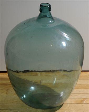 Appraisal: Green Blown Glass Demijohn in