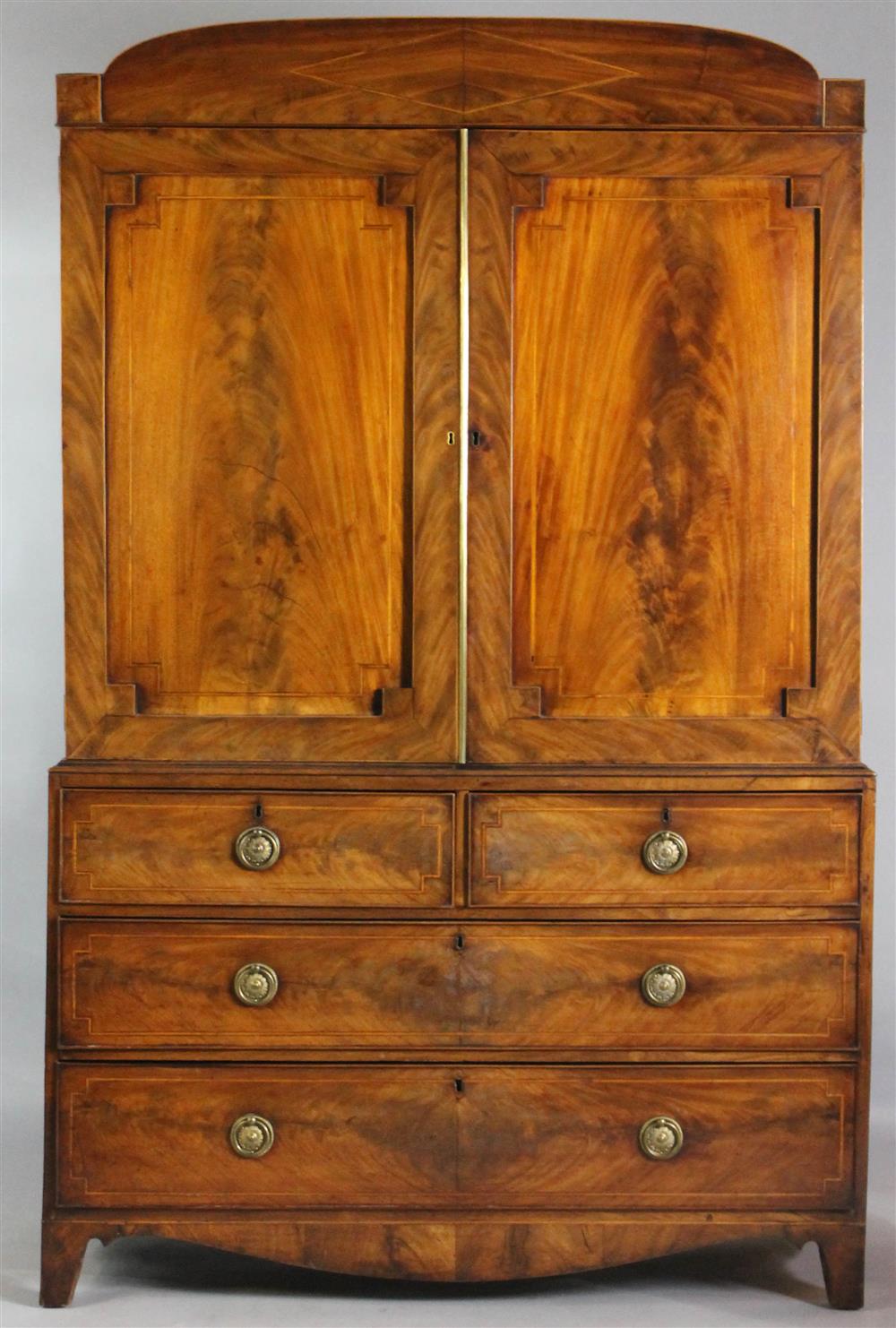 Appraisal: FINE GEORGIAN INLAID MAHOGANY LINEN PRESS having an arched cornice