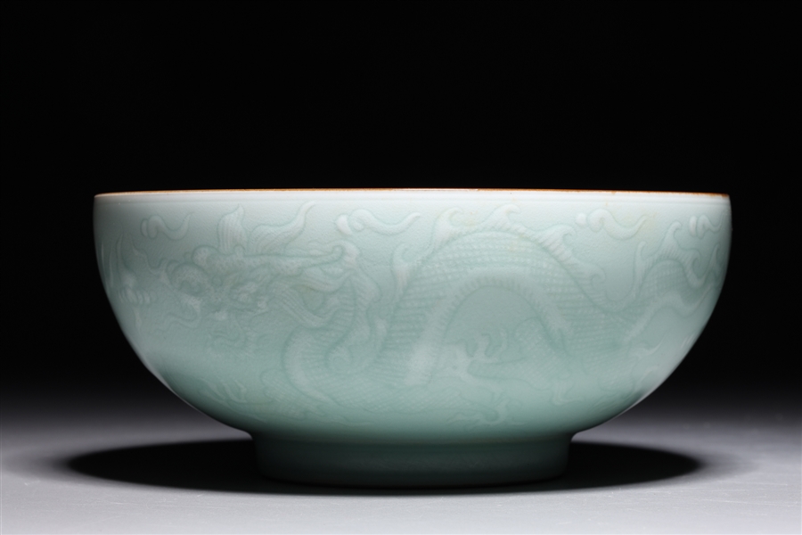 Appraisal: Chinese celadon glazed porcelain bowl with phoenix and floral designs