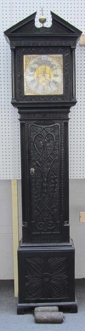 Appraisal: An th century and later carved ebonised oak eight day