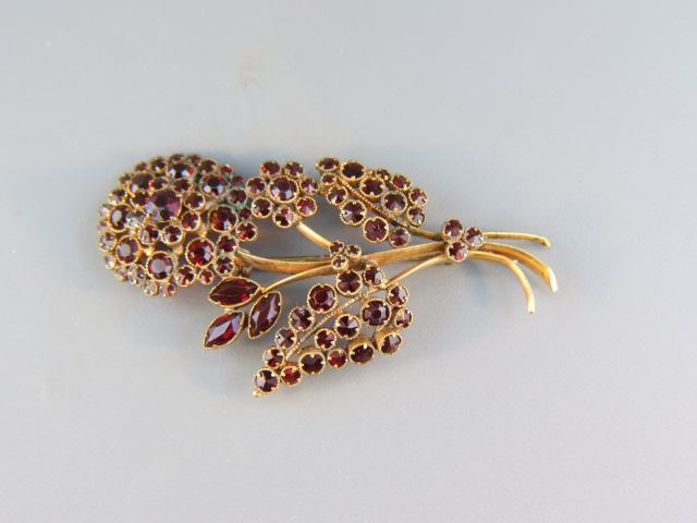 Appraisal: Garnet Brooch vivid round gems in antique setting X