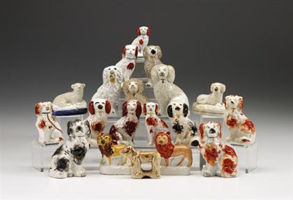 Appraisal: Group of Staffordshire animal figures th century Comprising fifteen seated