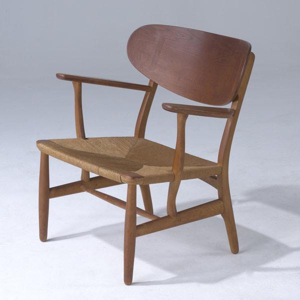 Appraisal: HANS WEGNER CARL HANSEN SON Armchair with grass seat on