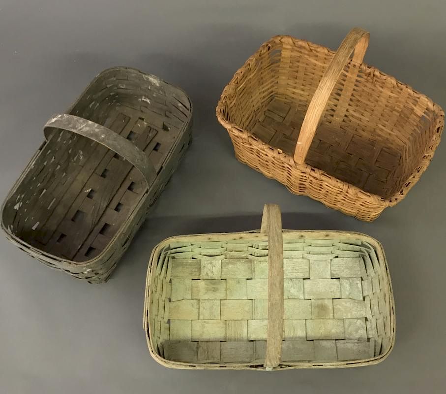 Appraisal: Three Splint-Wood Baskets Three splint-wood baskets largest h x w