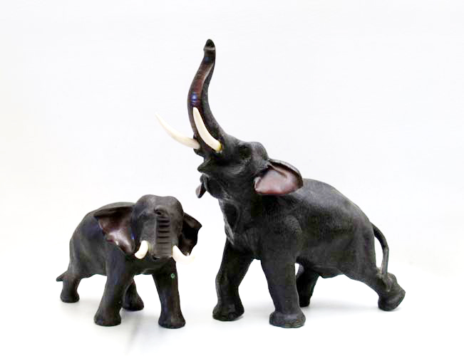 Appraisal: SET OF TWO JAPANESE BRONZED METAL ELEPHANT SCULPTURES with bone