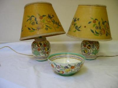 Appraisal: A PAIR OF CHARLOTTE RHEAD POTTERY LAMPBASES of ovoid form