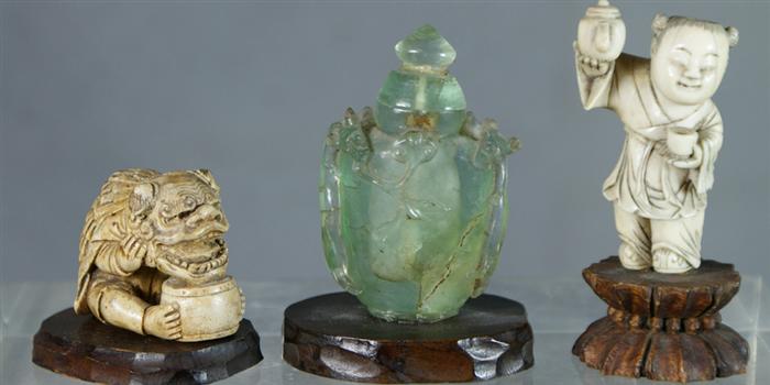 Appraisal: Pale green floral carved stone snuff bottle with interior fractures