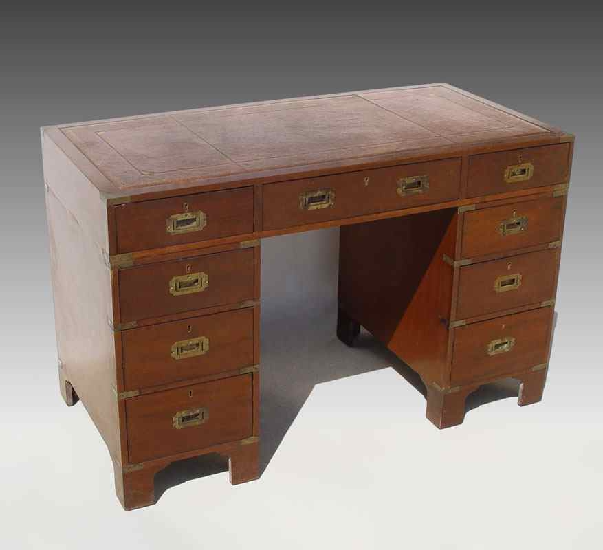 Appraisal: LATE CAMPAIGN STYLE DESK Upper section with drawers and leather