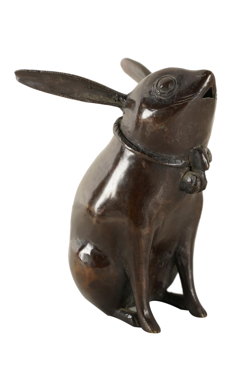 Appraisal: CHINESE BRONZE RABBIT-FORM CENSERwith a hinged lid inches high Condition