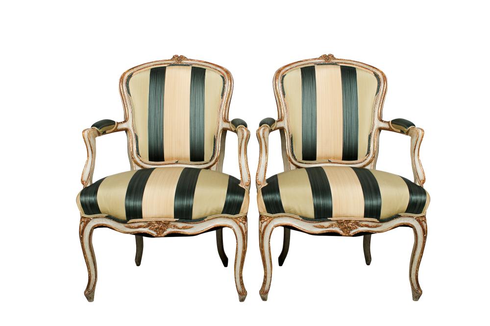 Appraisal: PAIR OF PROVINCIAL STYLE PAINTED AND PARCEL GILT FAUTEUILS inches